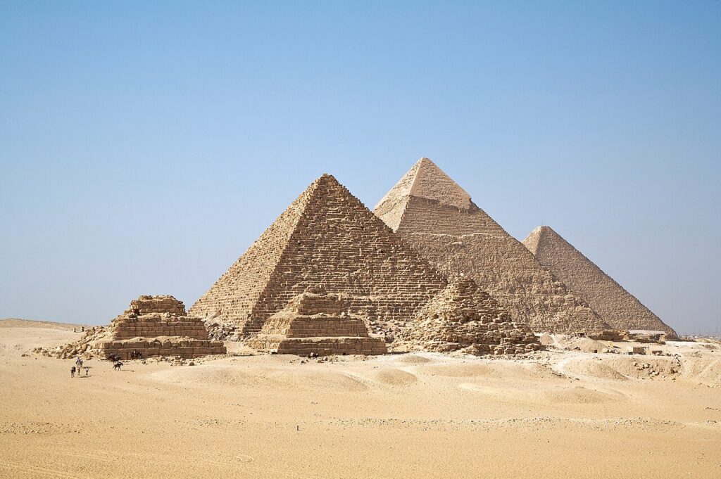 The Pyramids of Giza on the Giza Plateau, including the Great Pyramid of Khufu and the Great Sphinx.