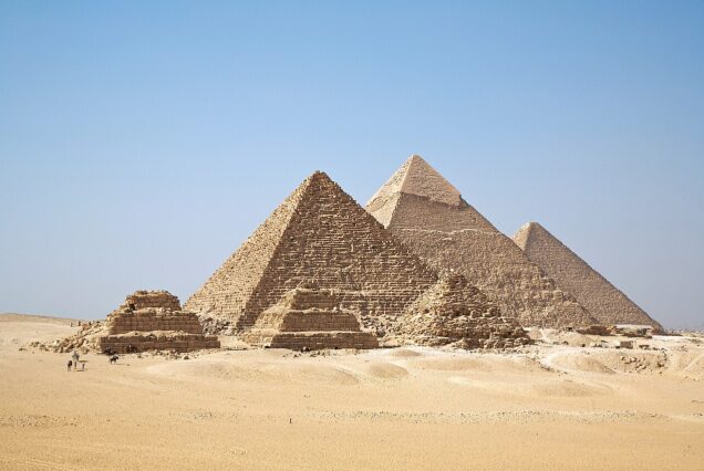 The Pyramids of Giza on the Giza Plateau, including the Great Pyramid of Khufu and the Great Sphinx.