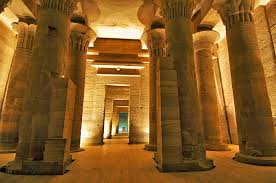 Interior view of the Philae Temple complex in Aswan, Egypt, featuring its distinctive ancient columns.
