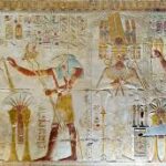 "Interior view of the Temple of Seti I in Abydos, Egypt, showing chapels dedicated to major gods and the Osireion underground structure."