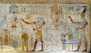 Relief carving in the Temple of Seti I at Abydos, showing Pharaoh Seti I with Egyptian deities in New Kingdom style.