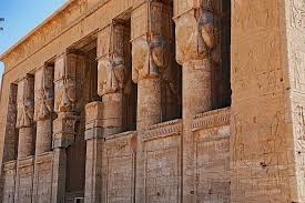 Temple of Hathor at the Dendera Temple Complex with Hathoric columns and detailed carvings.