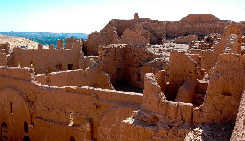 View of the Monastery of St. Simeon in Aswan, an ancient Coptic Orthodox fortress-like structure built of stone and mud brick.