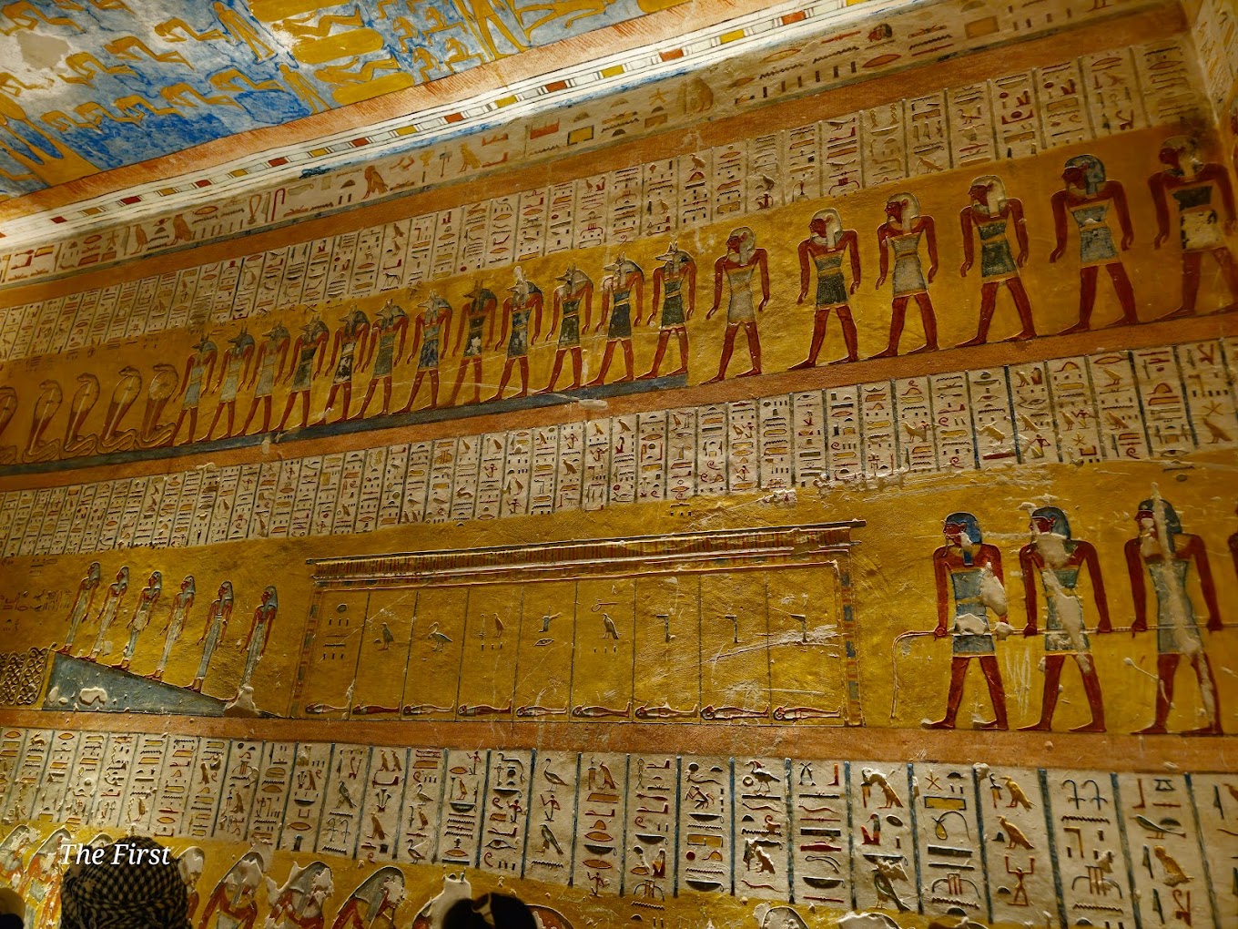 Interior of a tomb in the Valley of the Kings near Luxor, Egypt, with colorful hieroglyphs and wall paintings