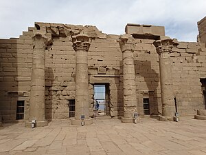 The Temple of Kalabsha, featuring its grand stone entrance and detailed reliefs, located on New Kalabsha Island near Aswan, Egypt.