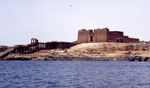 Exterior view of the Temple of Kalabsha on New Kalabsha Island near Aswan, Egypt, showcasing its monumental sandstone walls and pylons.