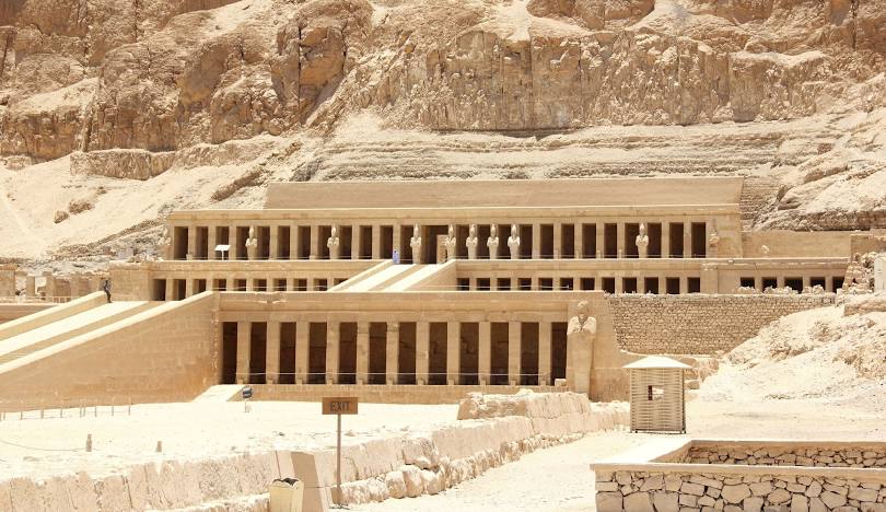 The Mortuary Temple of Hatshepsut at Deir el-Bahari, Luxor, with its unique terraced design and colonnaded courtyards.