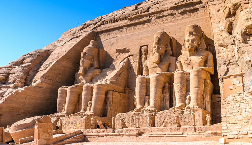 The facade of the Great Temple of Abu Simbel with colossal statues of Ramses II, Nubia, Egypt