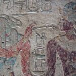 Relief from Beit el-Wali Temple depicting a pharaoh, Ramses II, interacting with the ram-headed god Khnum.