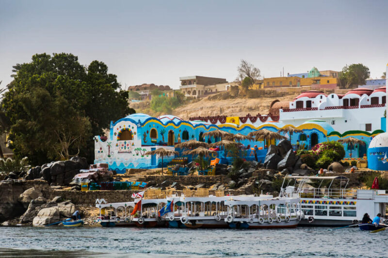 Colorful houses and vibrant streets of the Nubian Village on the west bank of the Nile in Aswan, Egypt.