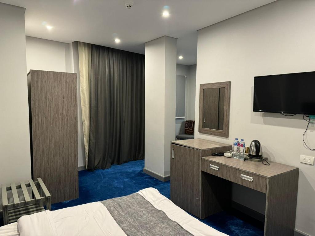 Hotel room at Nuba Nile Hotel in Aswan, Egypt, featuring air-conditioned accommodation with private bathroom and free Wi-Fi, located near the Nile River.