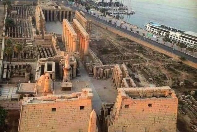 "Luxor Temple on the east bank of the Nile in Luxor, Egypt, showing monumental pylons, statues, and ancient relief carvings."