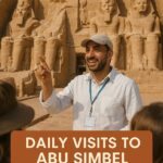 "Colossal statues of Pharaoh Ramses II at the Great Temple of Abu Simbel, southern Egypt, carved into a sandstone cliff with intricate ancient carvings."