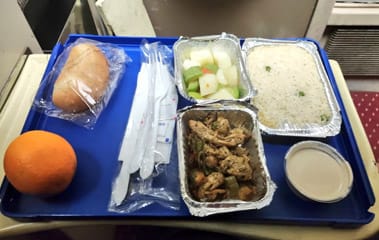 Breakfast and dinner served on the overnight sleeper train from Giza to Aswan, offering traditional Egyptian and international meal options for passengers.