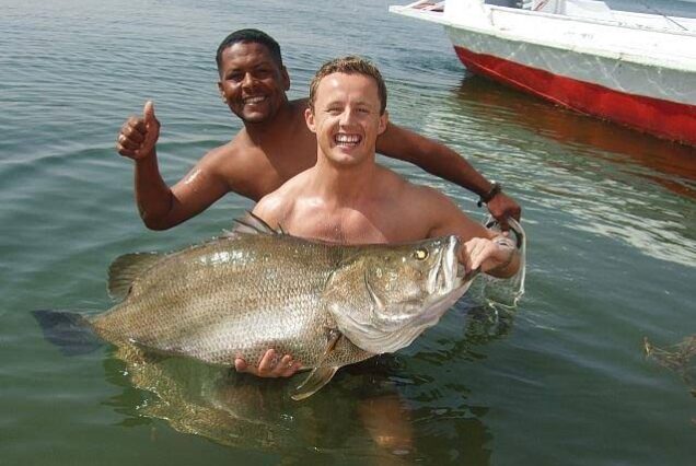 Anglers catching fish on Lake Nasser, Egypt, a renowned destination for Nile Perch fishing.
