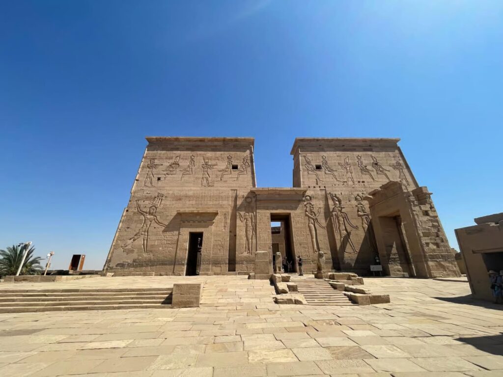Philae Temple Complex in Aswan, Egypt, featuring the Temple of Isis and other ancient structures relocated to Agilkia Island.