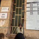 Alternative Text: The ticket office of an archaeological site in Egypt, where visitors purchase entry passes before exploring ancient monuments.