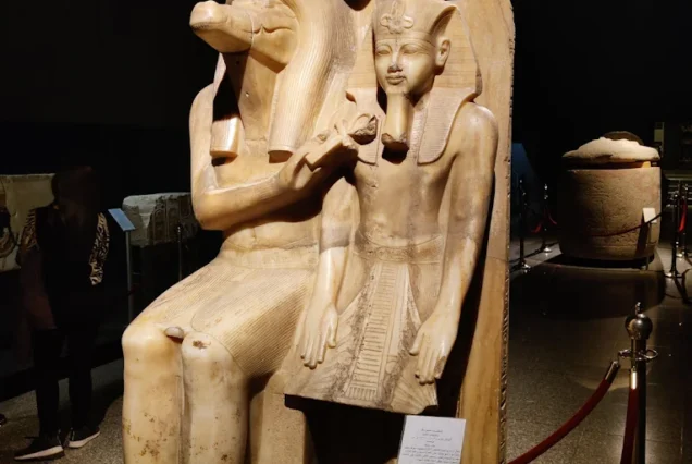 Double statue of the crocodile-headed god Sobek and Pharaoh Amenhotep III, carved from calcite, displayed in the Luxor Museum.
