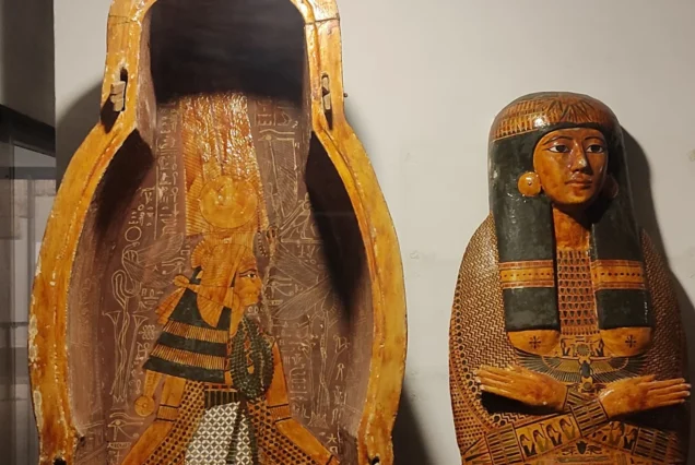 Ancient Egyptian coffin and mummy board of Pasebakhaemipet, decorated with intricate artwork, from the New Kingdom period.