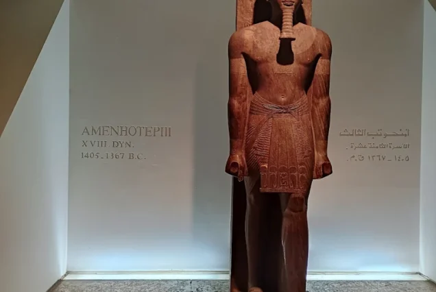 Statue of Pharaoh Amenhotep III from the 18th Dynasty, likely displayed in the Luxor Museum, Egypt