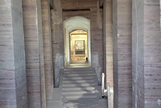 Interior of a rock-cut tomb at Qubbet el-Hawa, Aswan, Egypt, showing ancient burial chambers of nobles from the Old and Middle Kingdoms.