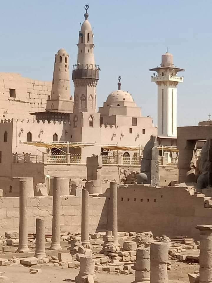 "The Abu Haggag Mosque built within the ruins of Luxor Temple, blending Islamic and ancient Egyptian architecture."