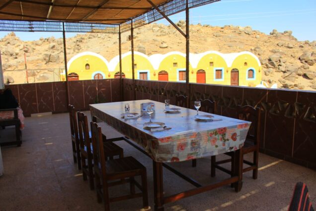 Traditional Nubian guest house on an island in the Nile surrounded by water and natural scenery.