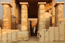 This image shows the colonnade entrance to the Step Pyramid complex of Djoser in Saqqara, Egyp